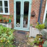 French Doors uPVC chartwell green with Cat flap