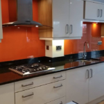 Orange glass splashback